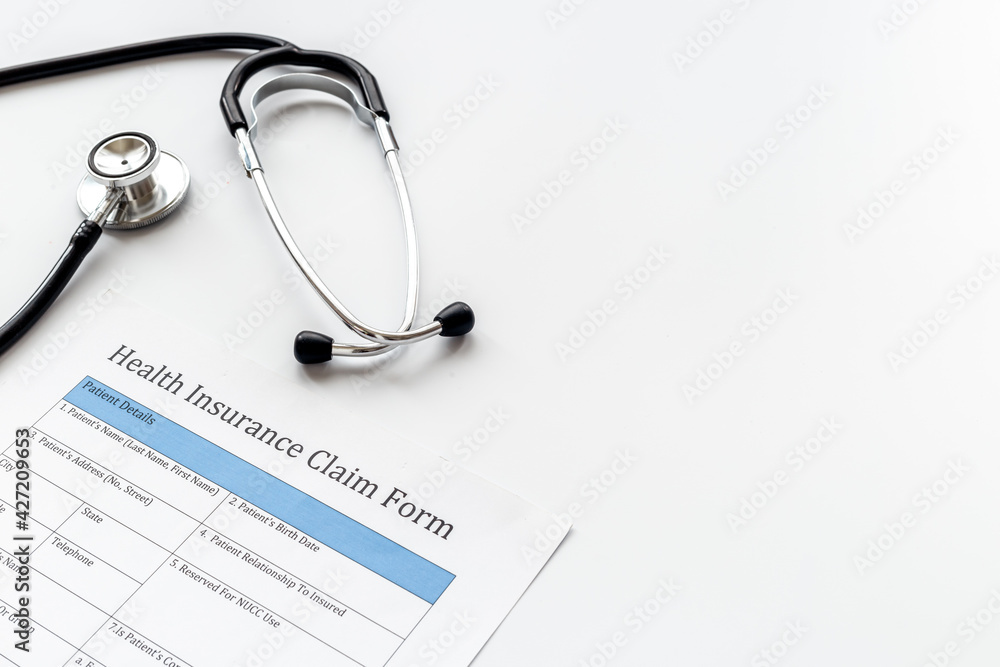 Health insuranse claim form with stethoscope. Medical care concept. Health insuranse claim form with stethoscope. Medical care concept.