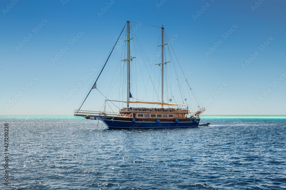 Luxury sail yacht in cruise on tropical sea in summer time, Red Sea, Egypt Luxury sail yacht in cruise on tropical sea in summer time, Red Sea, Egypt