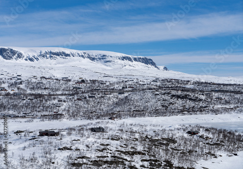 View of the frozen lake Sløddfjorden near the village of Haugastøl, in the municipality of Hol, Viken County, Norway photo