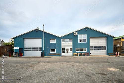 a large blue warehouse exterior in scandinavia