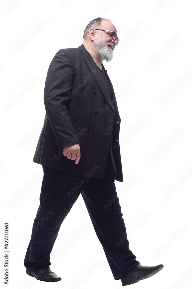 satisfied man in a business suit striding forward . satisfied man in a business suit striding forward .