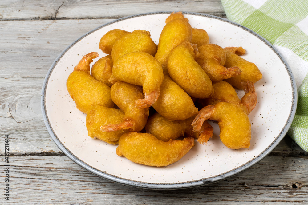 Fried prawns in tempura served on a plate Fried prawns in tempura served on a plate
