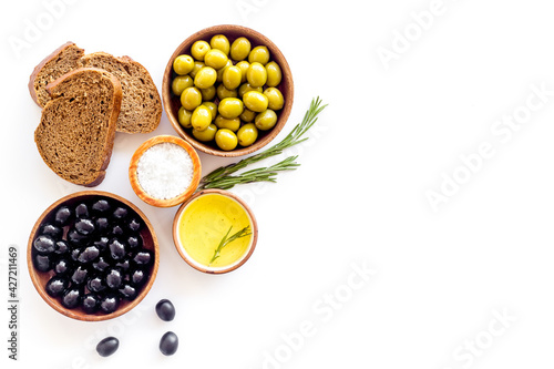 Sliced bread ciabatta with olives and oil. Greek or Italian meal