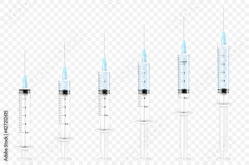 A set of medical syringes. The injection syringe is empty and filled with liquid. A set of disposable plastic syringes of various sizes for subcutaneous and intramuscular injections.