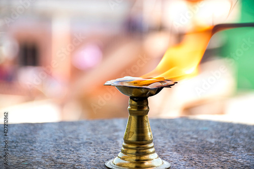Photography Stock photo of burning camphor kept in camphor holder camphor for presenting rituals at Bangalore Karnataka India