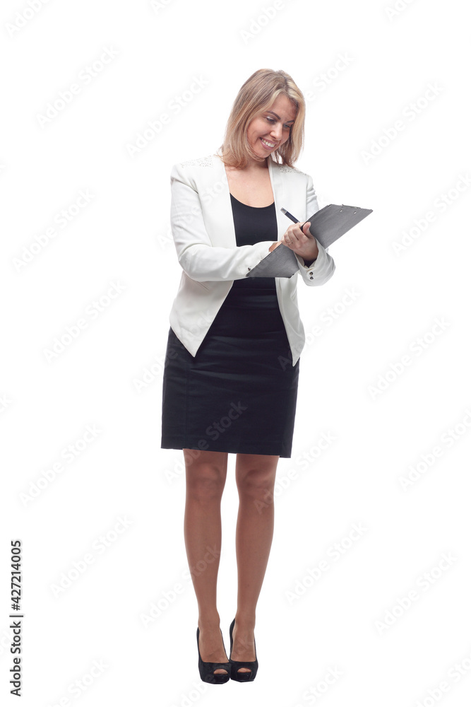 smiling business woman writes in the clipboard . smiling business woman writes in the clipboard .