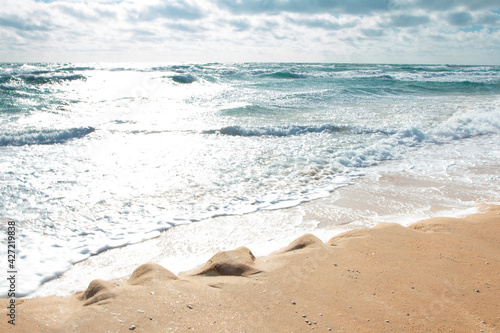 Sea beach with bright yellow sand