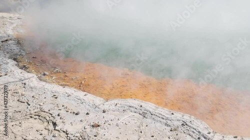 Thermal activity in a Champagne pool with boiling geothermal water at the Waiotapu Thermal Wonderland in Rotorua, New Zealand. photo