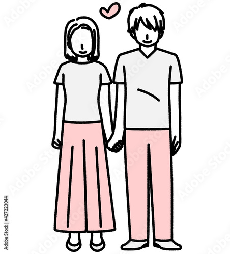 手を繋いで立っている男女