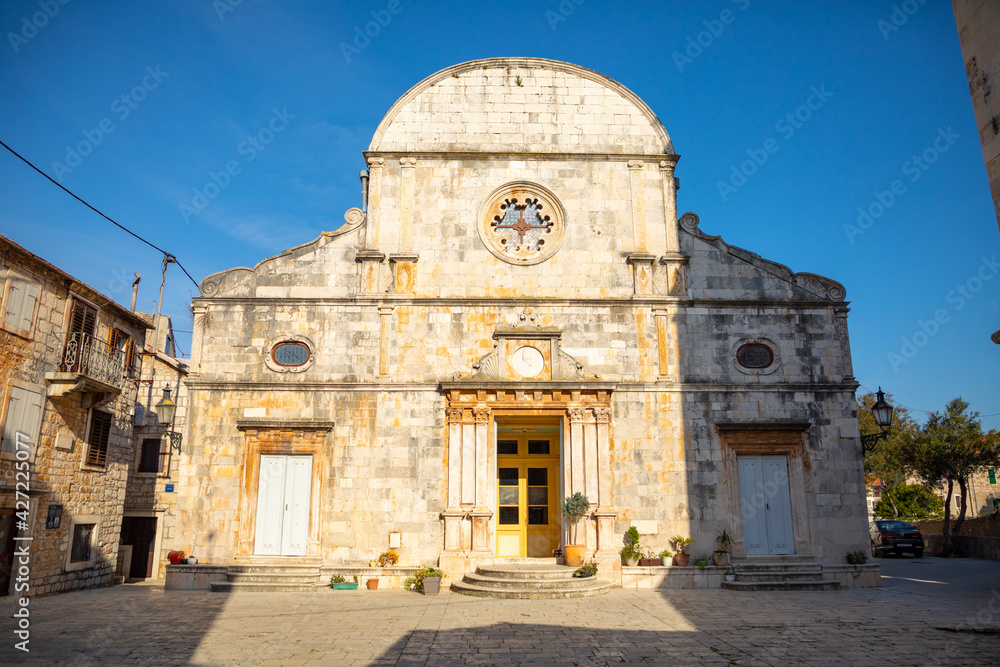Marble stone architecture at city center with Saint Stephan Church in Stari Grad, Croatia