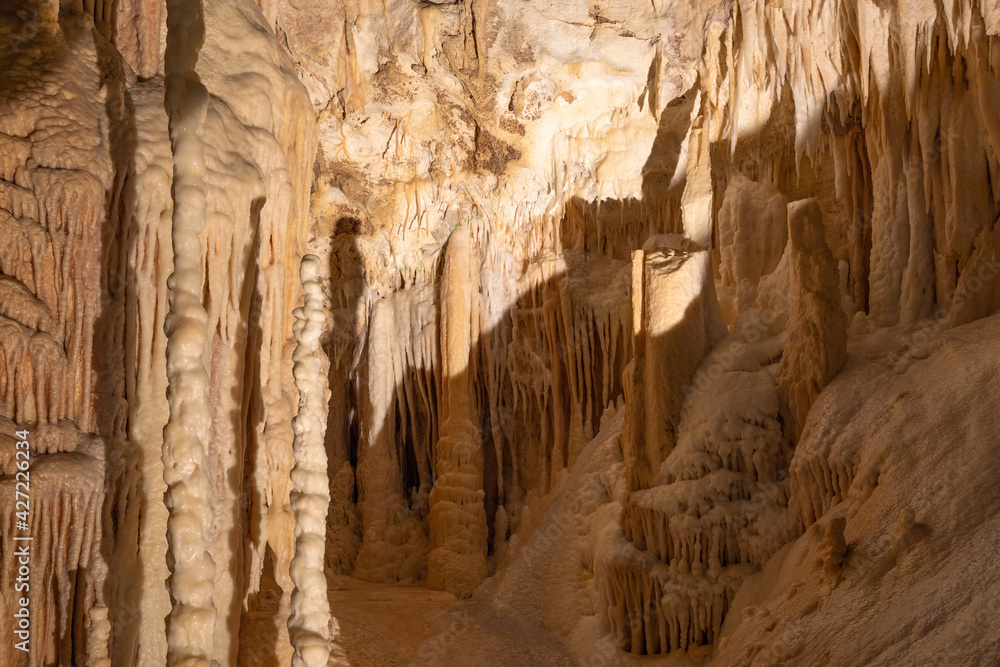 Stalactite and Stalagmite formations into the Frasassi Caves (Grotte di Frasassi), Marche, Ancona, Italy