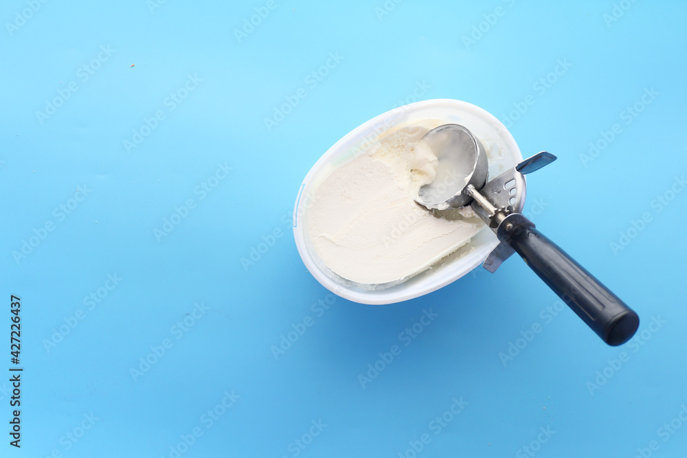 ice cream with a spoon from a bowl 