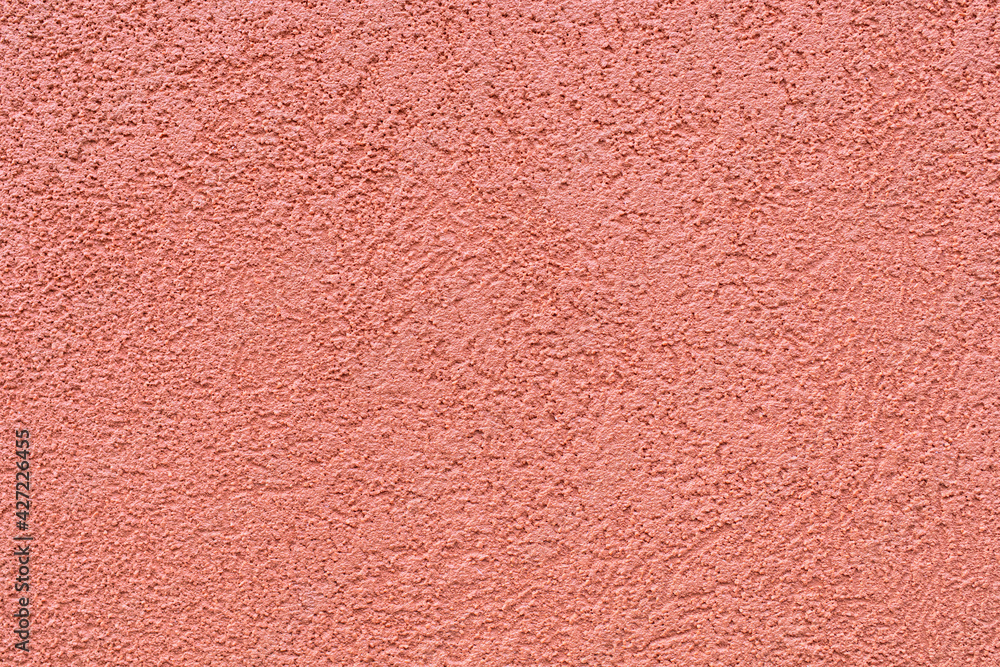 Ocher color texture of the plaster on the exterior walls Ocher color texture of the plaster on the exterior walls