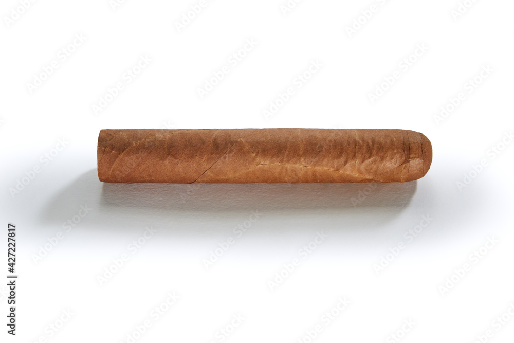 close up view of nice robusto Cuban cigar on white back close up view of nice robusto Cuban cigar on white back