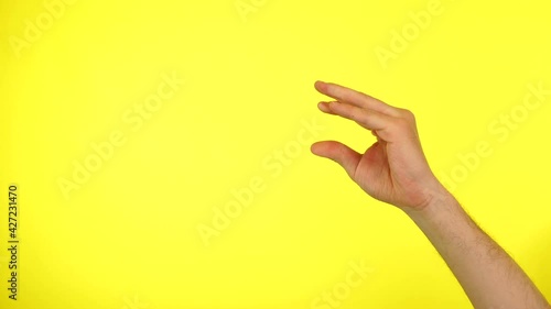 Man hands showing bla bla gesture, talking to each other over yellow background