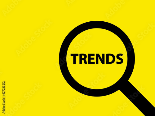 Magnifying glass with the words phrase trends on yellow background.
Vector Illustration. Trends 2021 Business Concept. Creativity,  marketing and inspiration ideas concept.