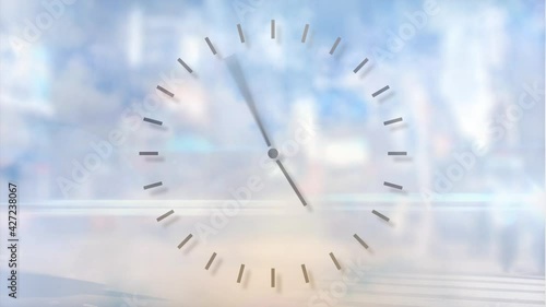 Digital composition of digital clock ticking against clouds in blue sky photo