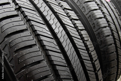 Symmetrical directional tire tread pattern for car. Tire surface texture