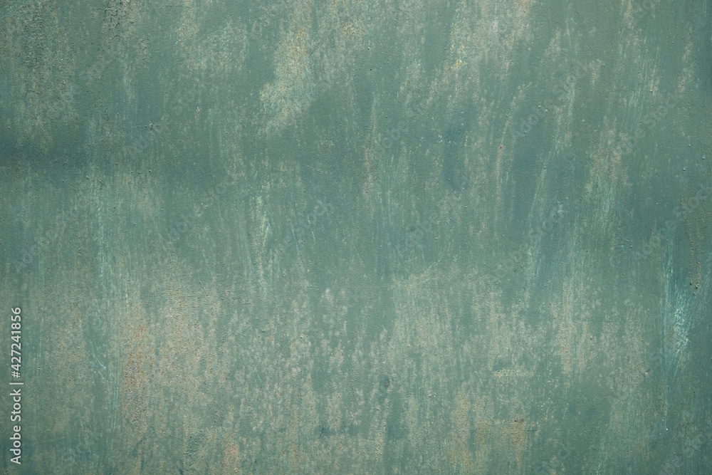 Rusty old metal texture with remnants of the paint. Grungy background for any design. 