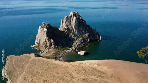 Lake Baikal in autumn. Cape Burkhan, Shamanka rock on the Olkhon island. Aerial view.