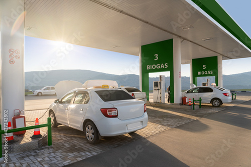 Obraz na plátne Cars at the biogas filling station