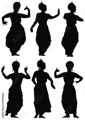 Collection of silhouettes Oriental dances of women on a white background.