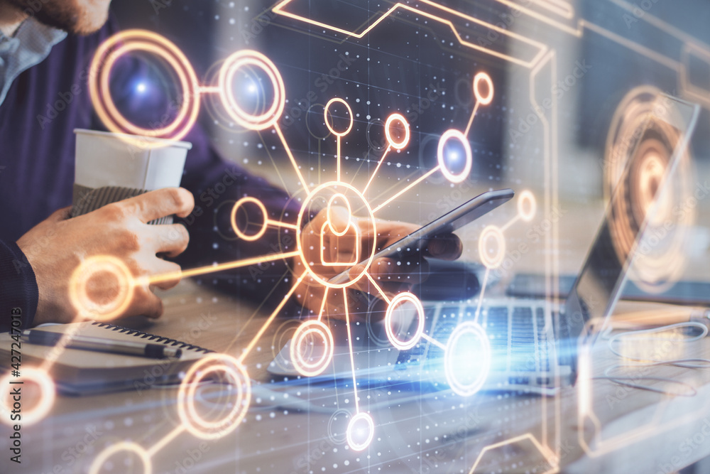 Double exposure of man's hands holding and using a phone and social network theme drawing. Double exposure of man's hands holding and using a phone and social network theme drawing.