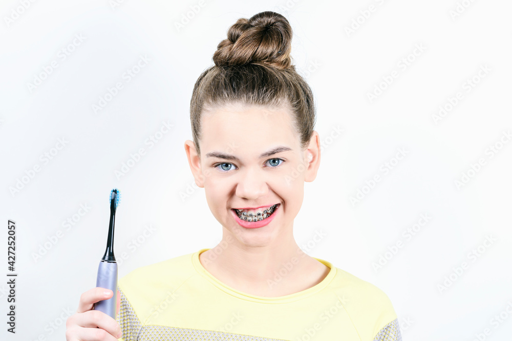 Girl with toothbrush. Concept of dentistry and installation of braces. Girl with toothbrush. Concept of dentistry and installation of braces.