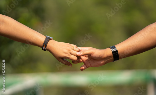 Couple Holding Each Others Hands