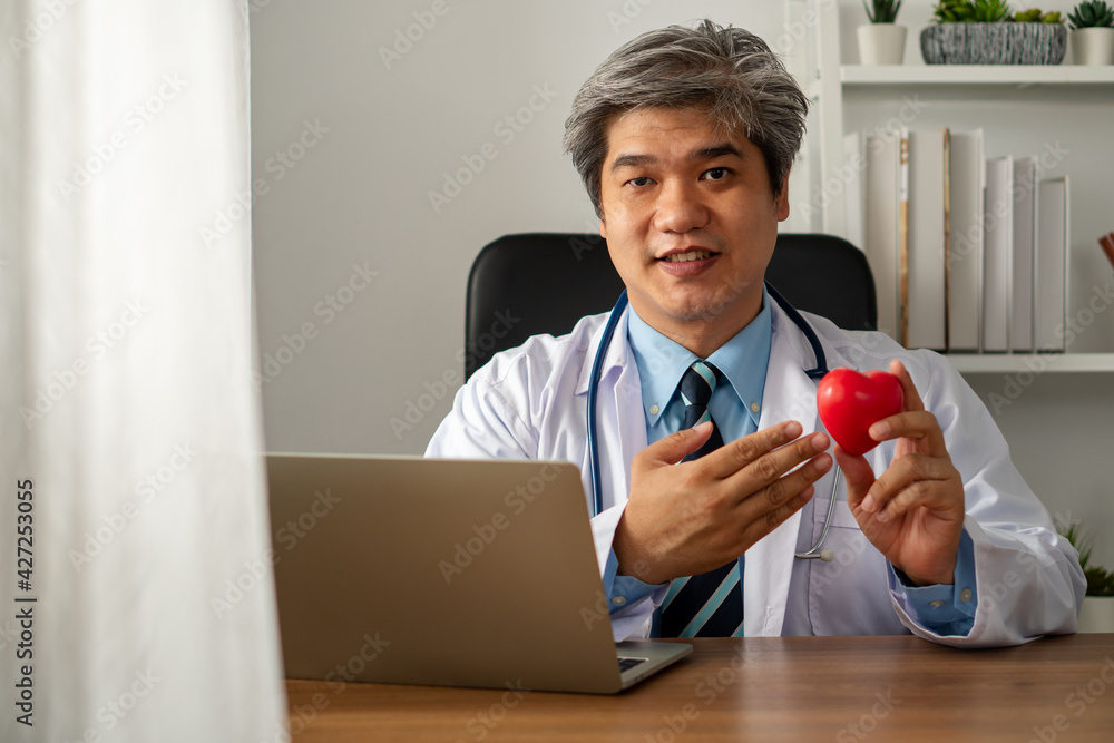 Vlog Asian doctor blogger influencer recording video blog for educating about heart disease for patient and students on the internet and social media. Concept of the content creator online. Vlog Asian doctor blogger influencer recording video blog for educating about heart disease for patient and students on the internet and social media. Concept of the content creator online.