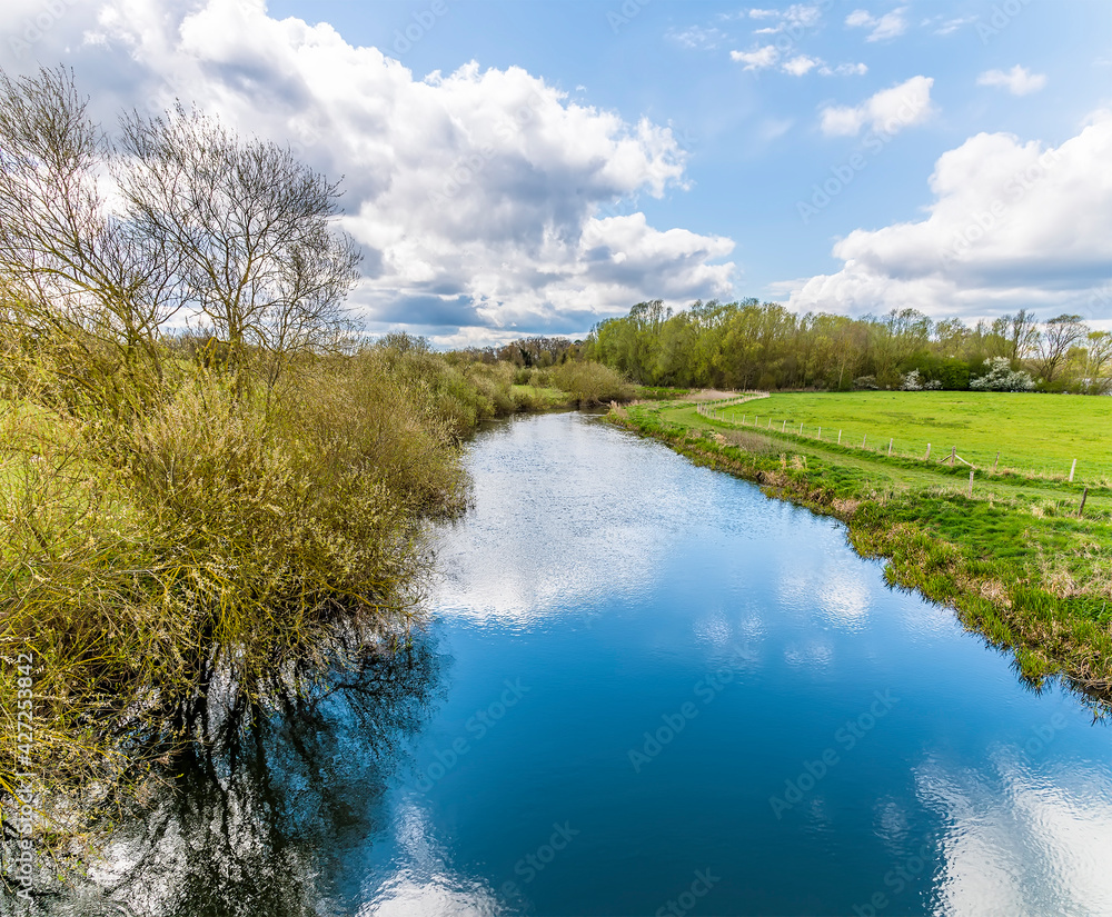 A view down the River Nene on the outskirts of Thrapston, Northamptonshire in springtime A view down the River Nene on the outskirts of Thrapston, Northamptonshire in springtime