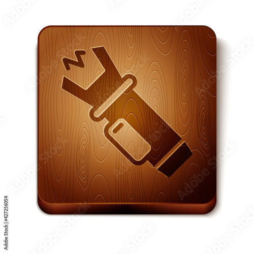 Brown Police electric shocker icon isolated on white background. Shocker for protection. Taser is an electric weapon. Wooden square button. Vector