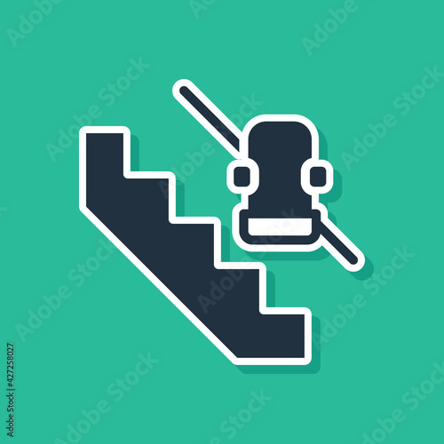 Blue Disabled access elevator lift escalator icon isolated on green background. Movable mechanical chair platform for handicapped human. Vector