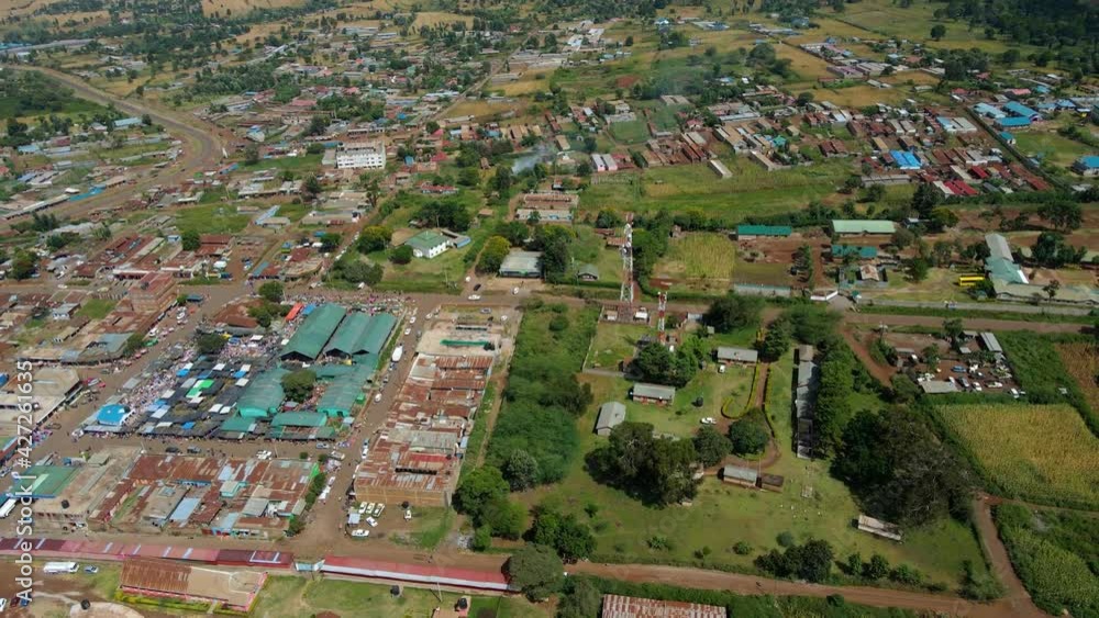 Aerial view of the Open Air market and a town, in Kenya - reverse, drone shot Aerial view of the Open Air market and a town, in Kenya - reverse, drone shot
