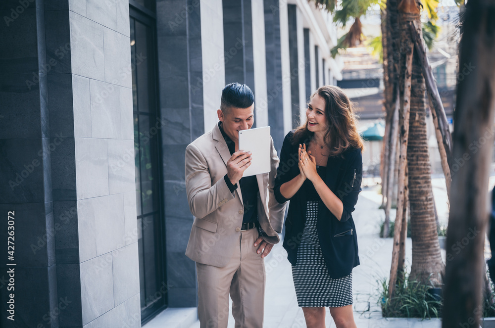 professional business worker person, woman meeting businessman in the morning, colleague corporate manager team talking outside office on the street in city building background