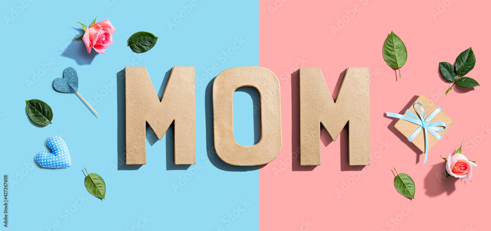 Mothers day theme with pink roses and small gift box Mothers day theme with pink roses and small gift box
