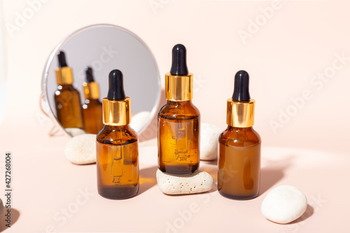 Facial serum glass bottle with pipette, natural organic spa cosmetic. Skin care concept - Image