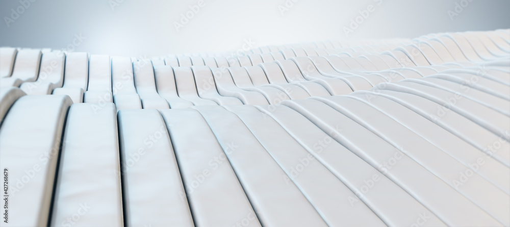 Obraz premium White wavy patterns with a light in the background closeup, wallpaper design concept. 3d rendering