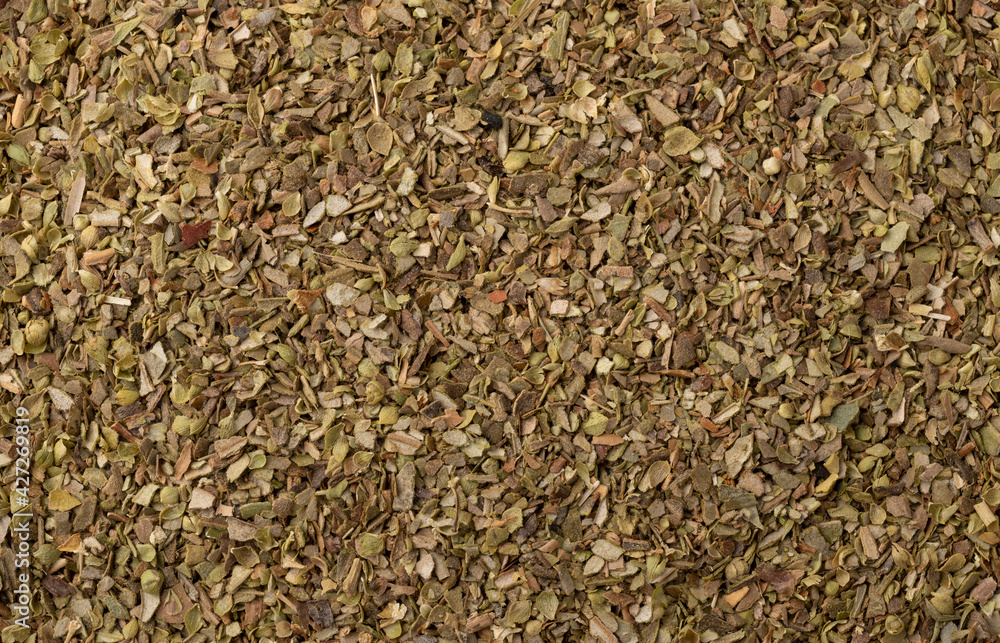 Top view, closeup of dried oregano. Food backdrop Top view, closeup of dried oregano. Food backdrop