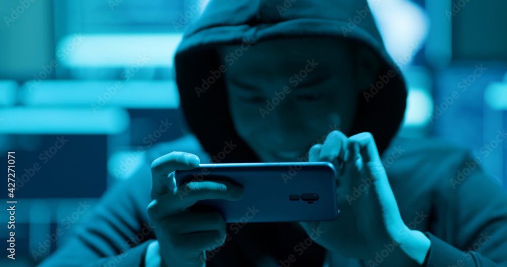 closeup of asian male hacker