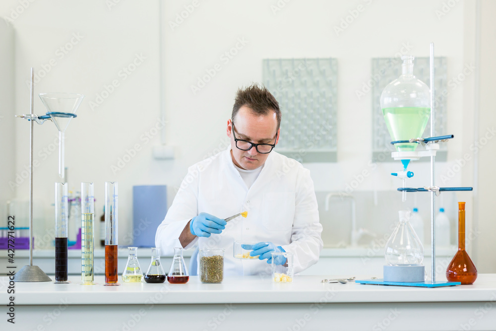 Chemist working with terpene CBD crystals in laboratory Chemist working with terpene CBD crystals in laboratory