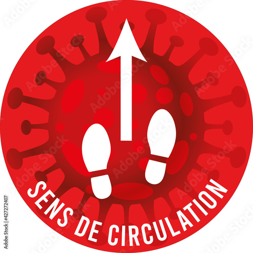 affiche pour signaler qu'il y a un sens de circulation en blanc représenté par une flèche et deux pas dans un rond rouge avec un dessin de virus en fond