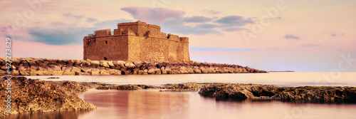 Pafos Harbour Castle in Pathos, Cyprus, on a sunset photo
