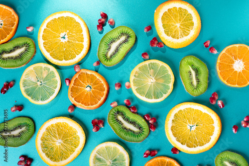Exotic tropical fruits slices as a background