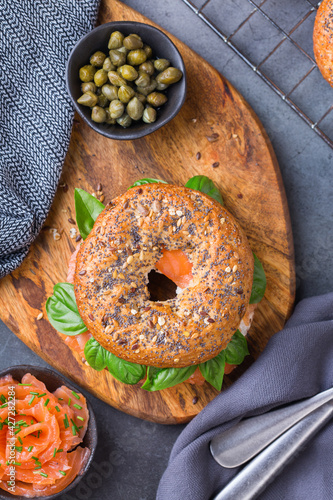 Bagels with cream cheese and salmon. Plating, fast lunch, meal.  photo