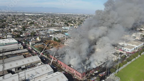 large commercial building up in flames photo