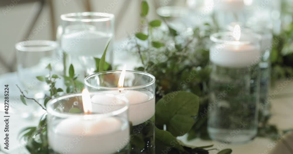Gorgeous wedding reception décor with vases filled with water and floating white candles and white linens at the Strathmere Wedding Centre and Spa. Gorgeous wedding reception décor with vases filled with water and floating white candles and white linens at the Strathmere Wedding Centre and Spa.