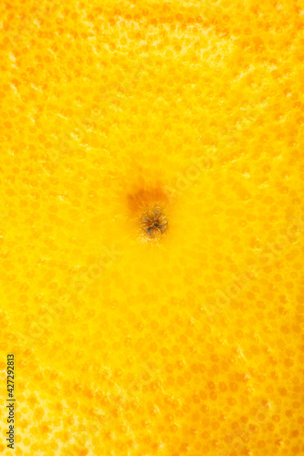 Close up photo of Grapefruit peel texture. Exotic ripe fruit background, macro view. .Human skin problem concept, acne and cellulite. Beautiful nature wallpaper.