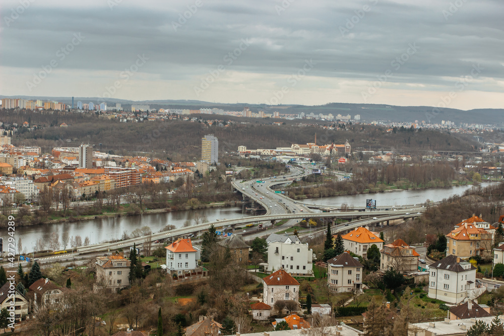 Prague,Czech republic Real estate residential concept.Czech architecture view from above.Panoramic city skyline.Barrandov Bridge over Vltava river with traffic,most frequented road.Transport in town