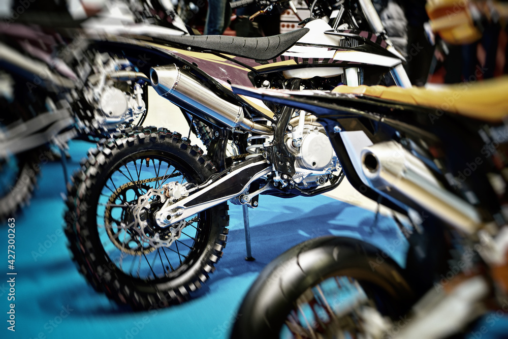 Motocross bikes in a sports store